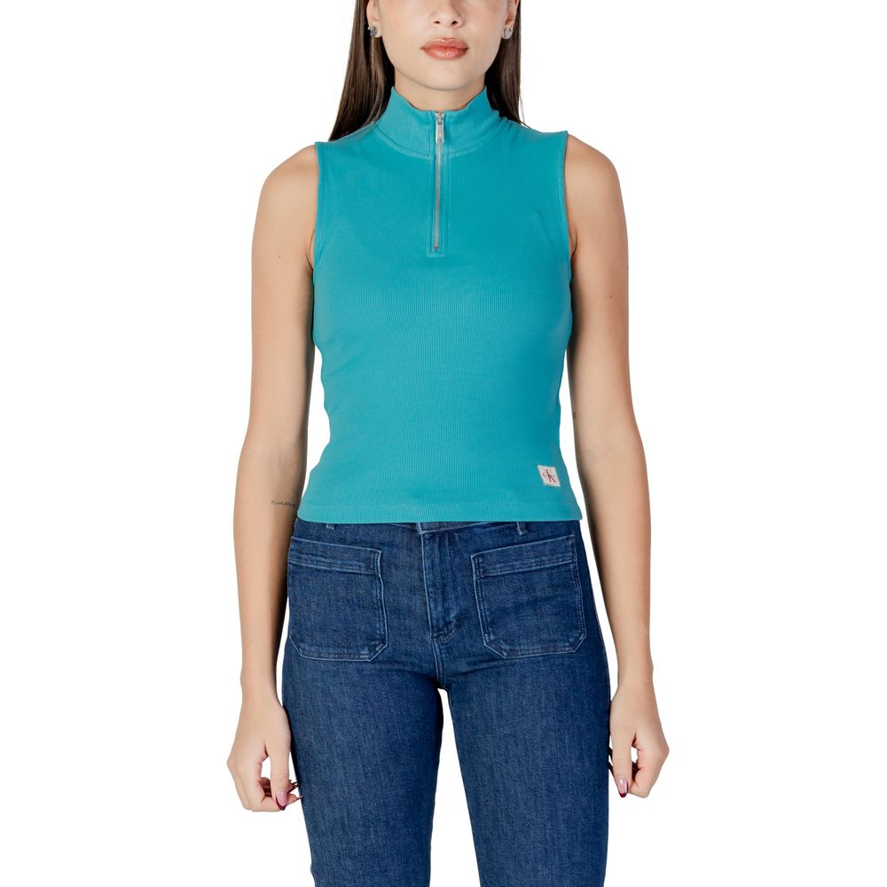 Woman wearing blue top and jeans