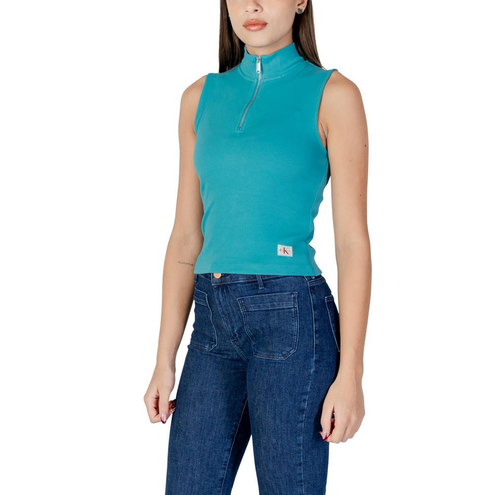 Woman wearing blue top and jeans