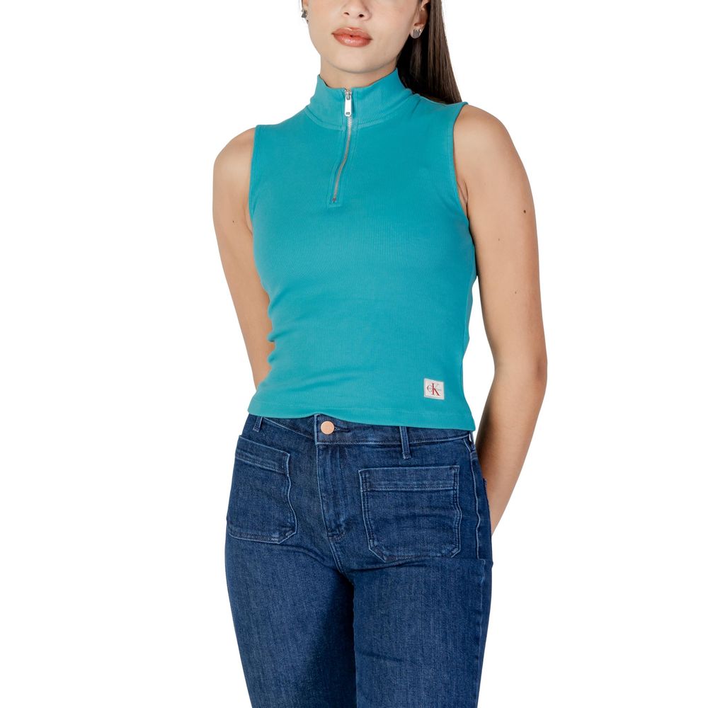 Woman wearing blue top and jeans