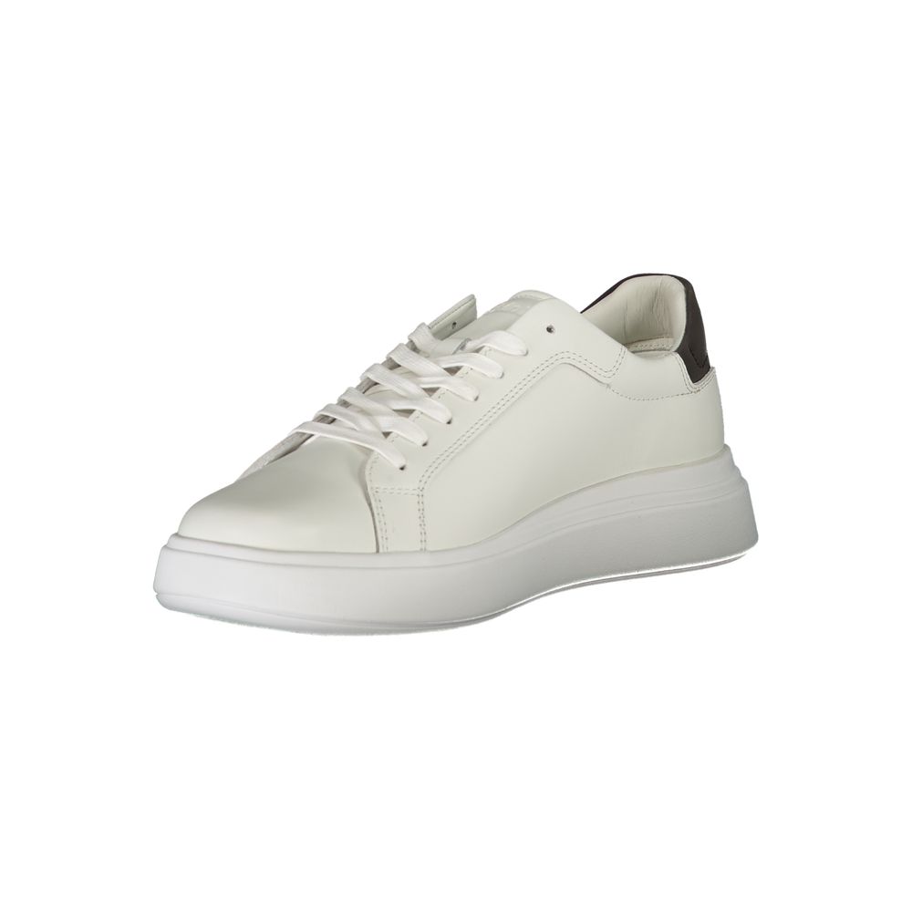A white leather men's sneaker with a lace-up front, featuring a low top and flat sole