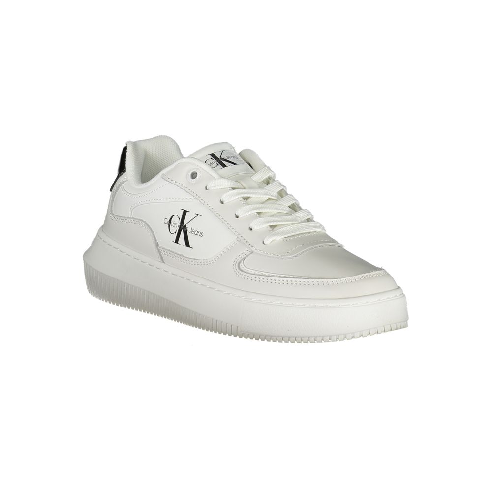 A white leather women's sneaker with a low top, lace-up front and a flat sole