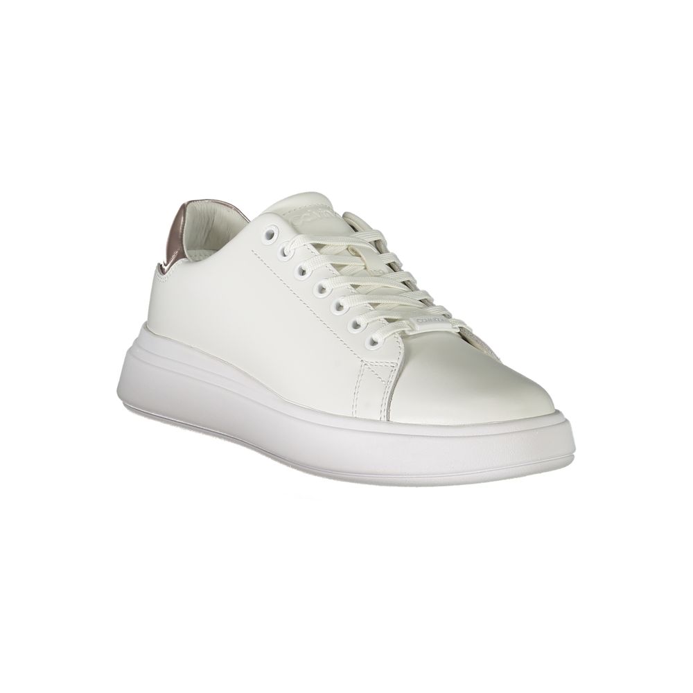 A white leather women's sneaker with a low top, lace-up front, and flat sole