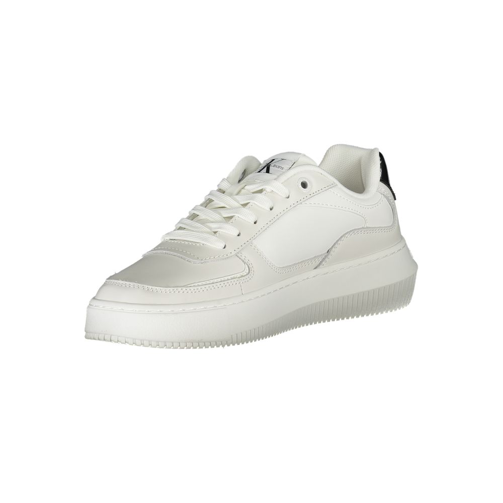 A white leather women's sneaker with a low top, lace-up closure and a chunky sole