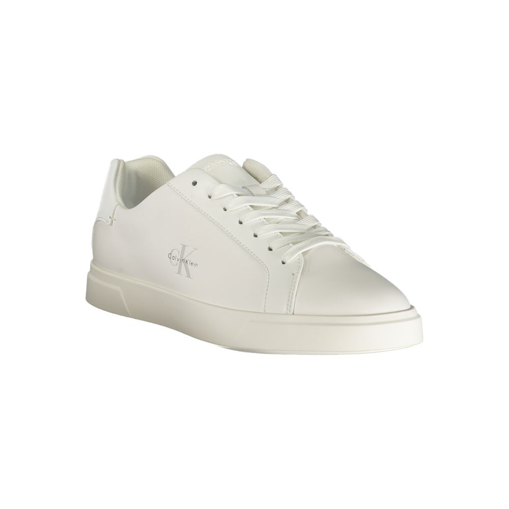 A white women's sneaker with a low top, featuring a lace-up front and a flat sole