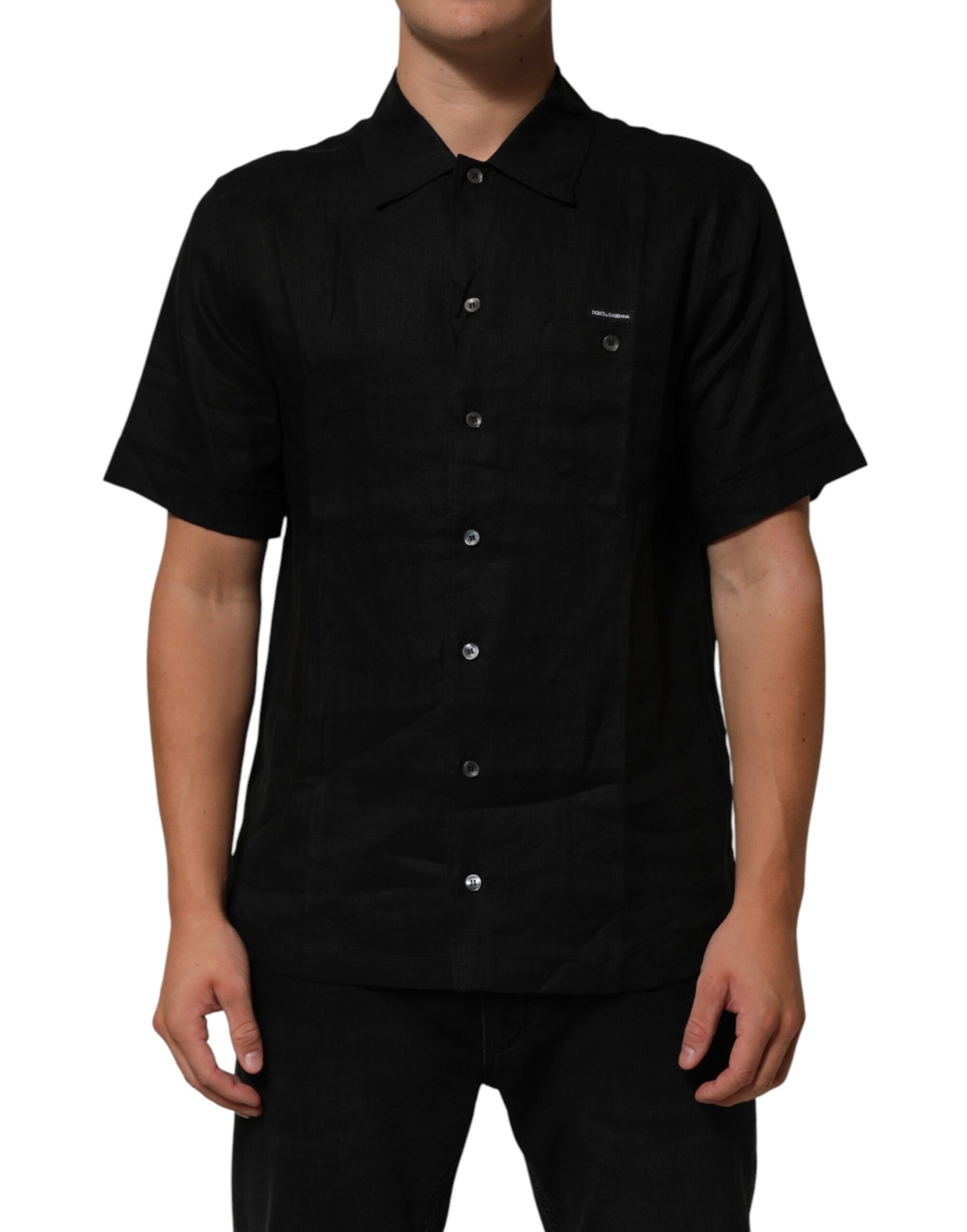 Man wearing black shirt with buttons down front