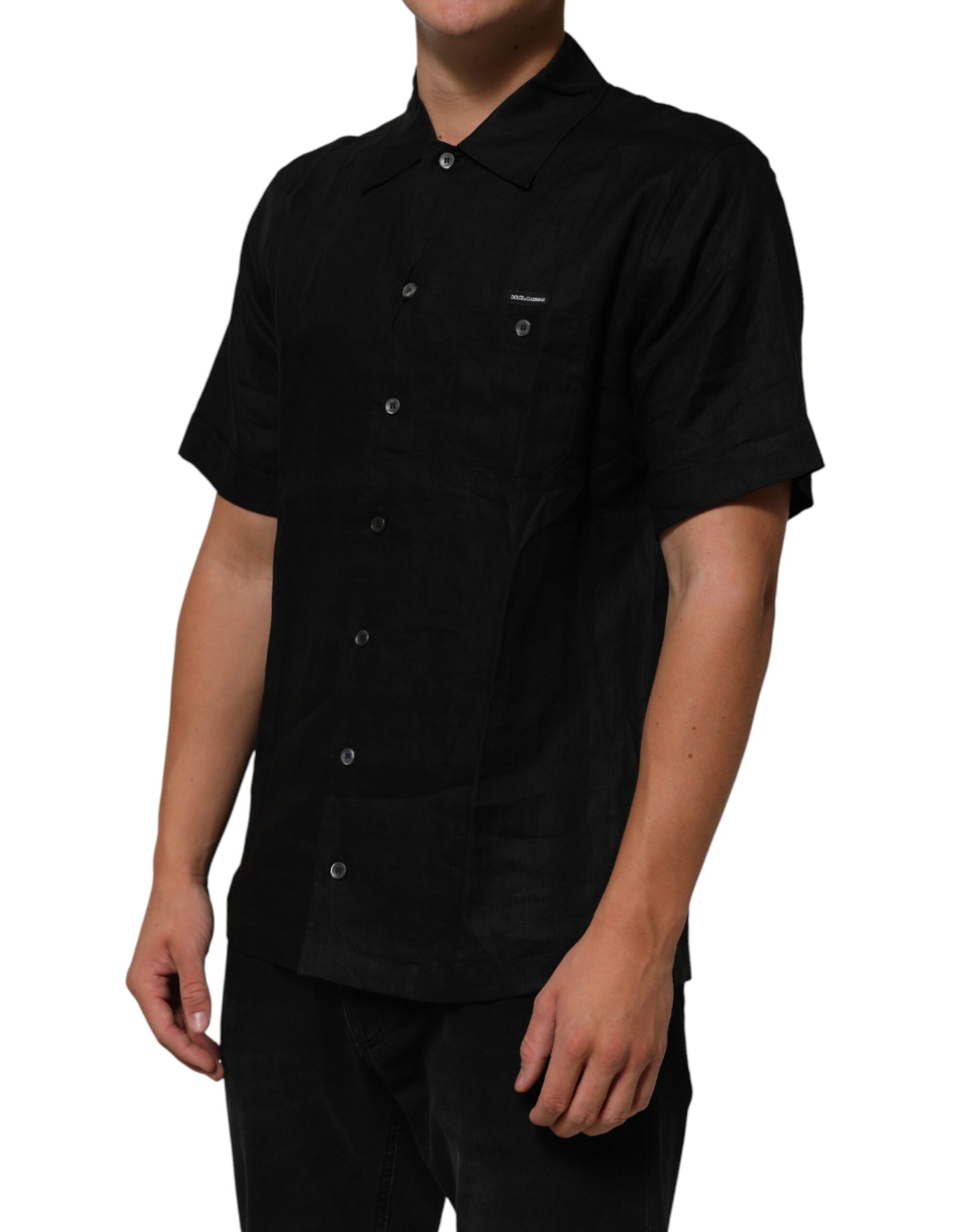 Black short sleeve shirt on a man