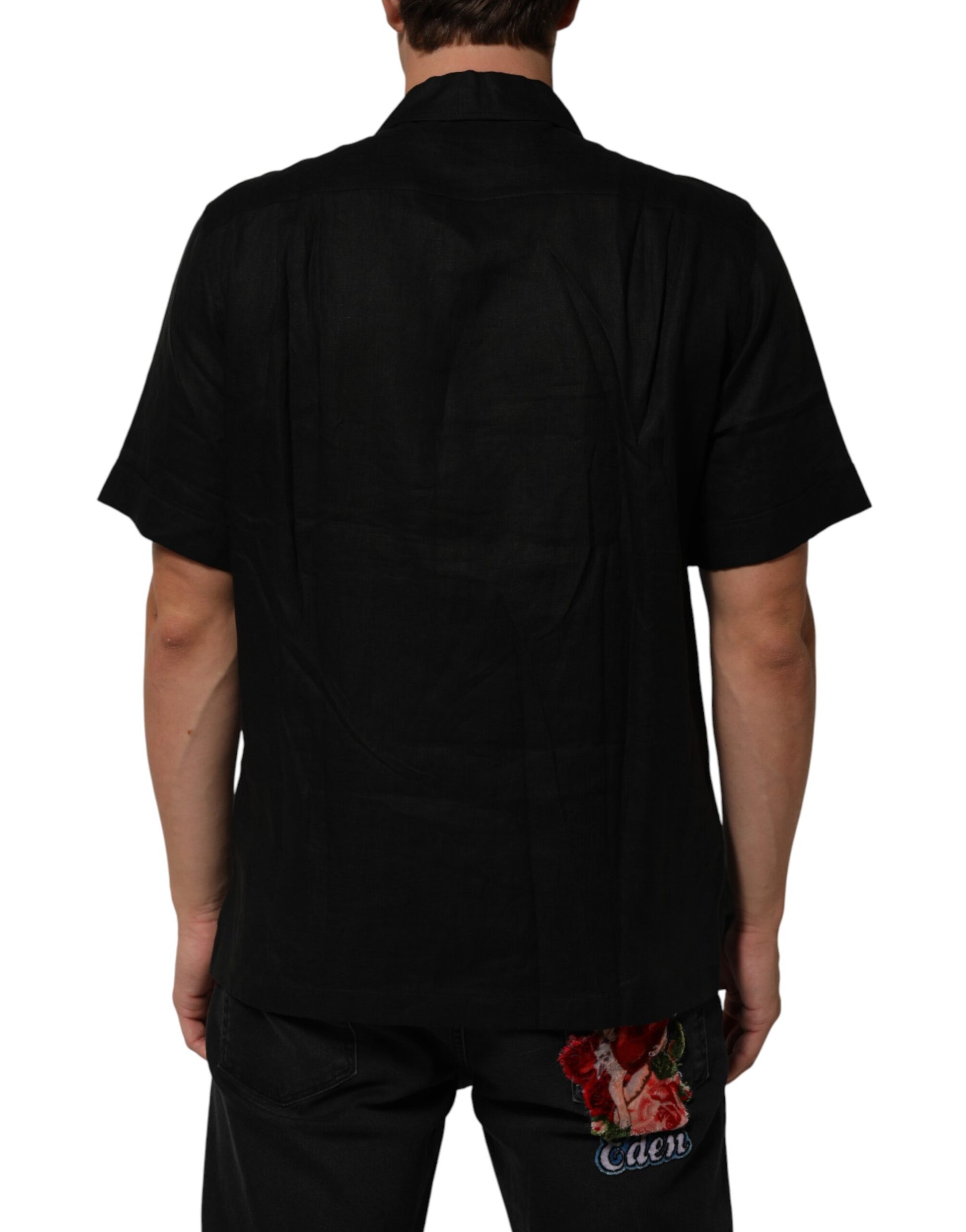 Black short sleeve shirt with floral design on back