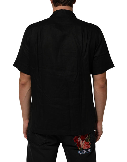 Black short sleeve shirt with floral design on back