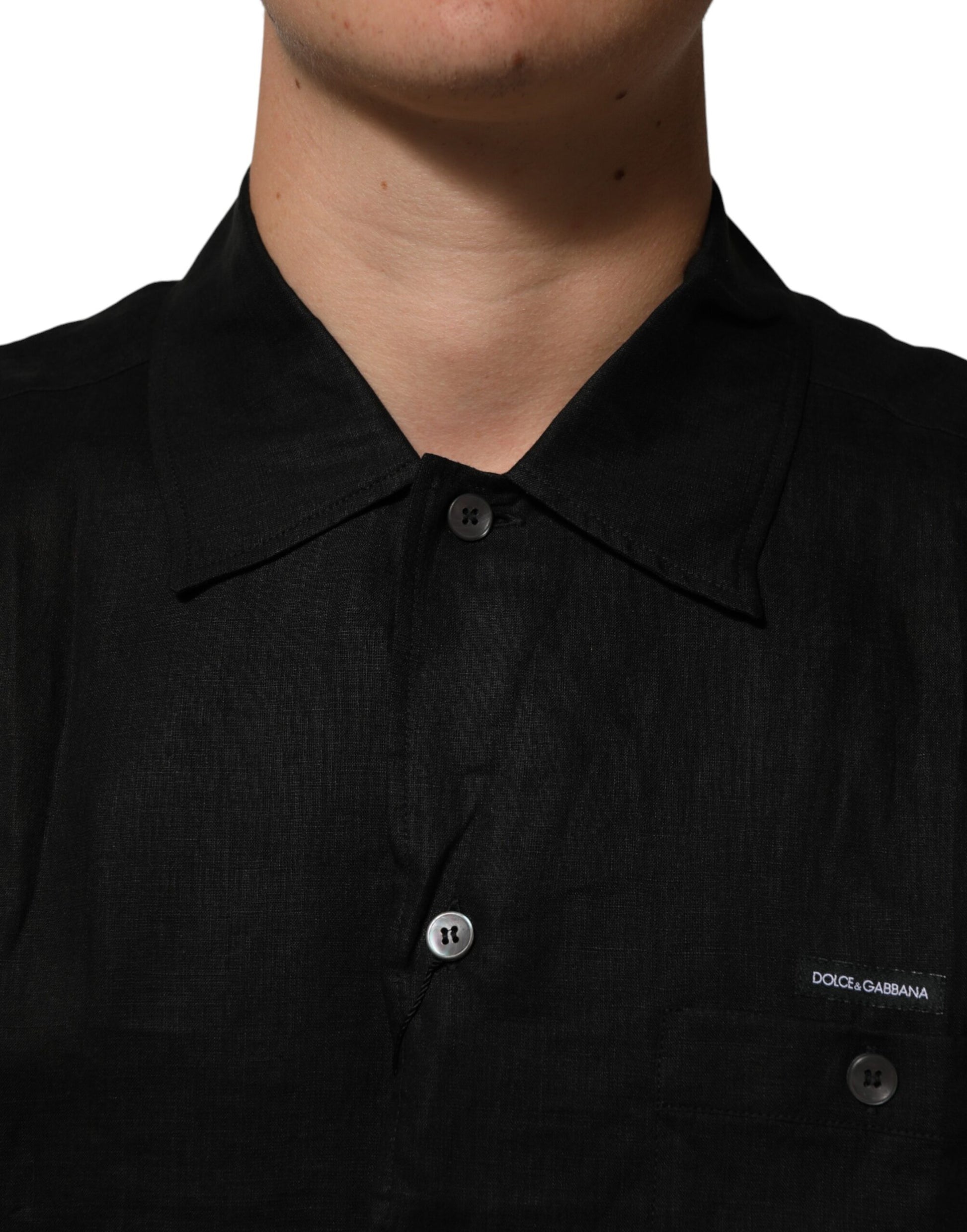 Black polo shirt with buttons down front