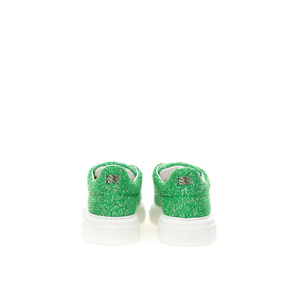 Pair of green and white sneakers with glittery embellishments on soles