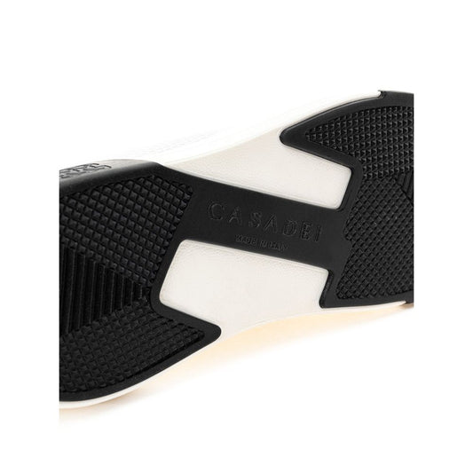 Black and white sneaker with a black sole