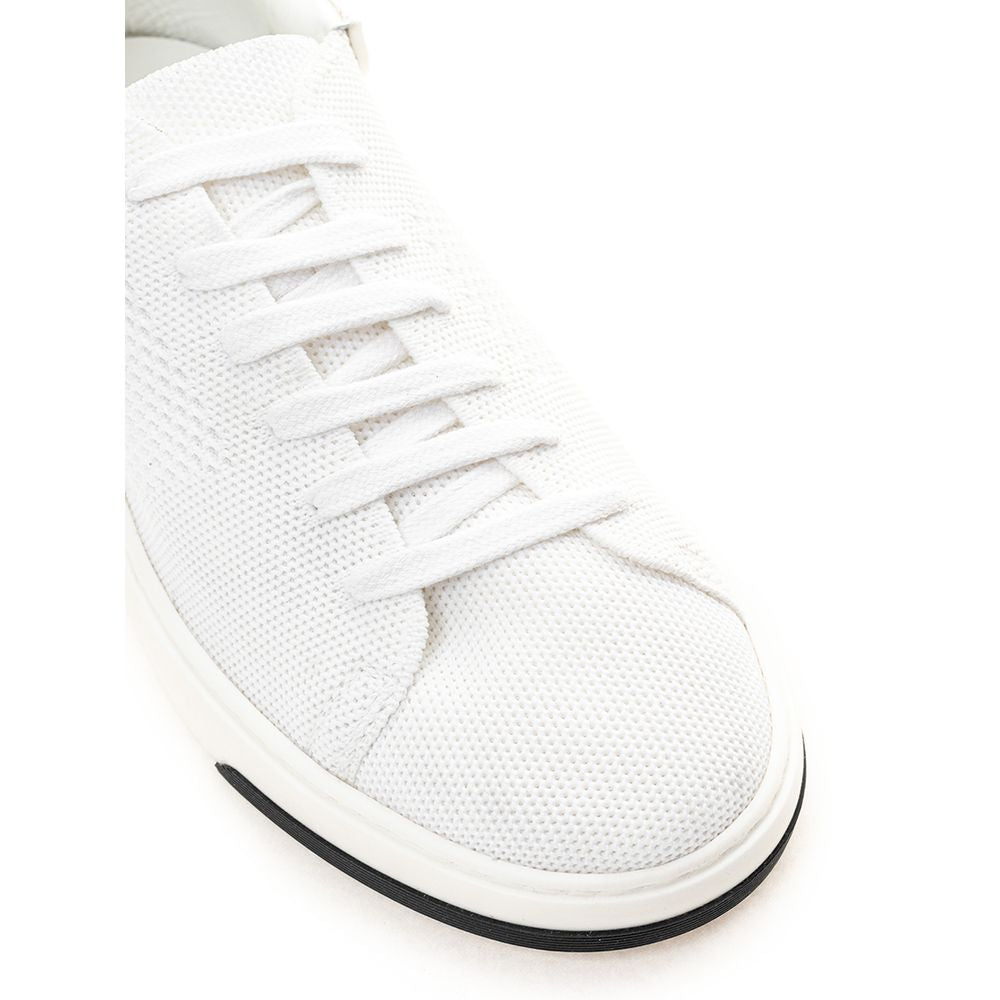 White sneaker with black laces and sole stripe