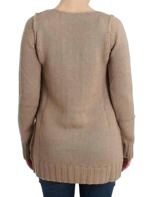Tan knit sweater with fringe details on back