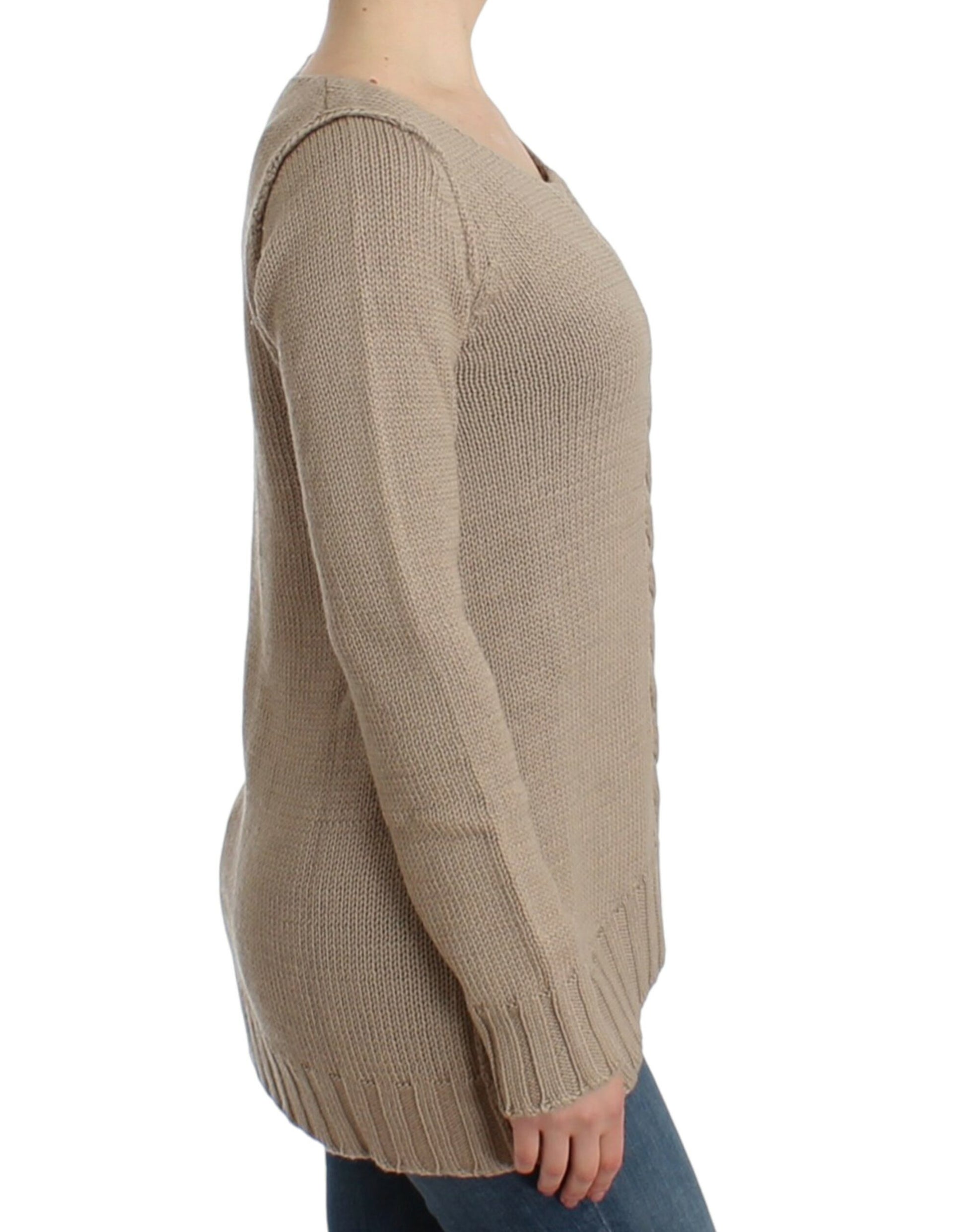Long sleeved knit sweater worn by woman