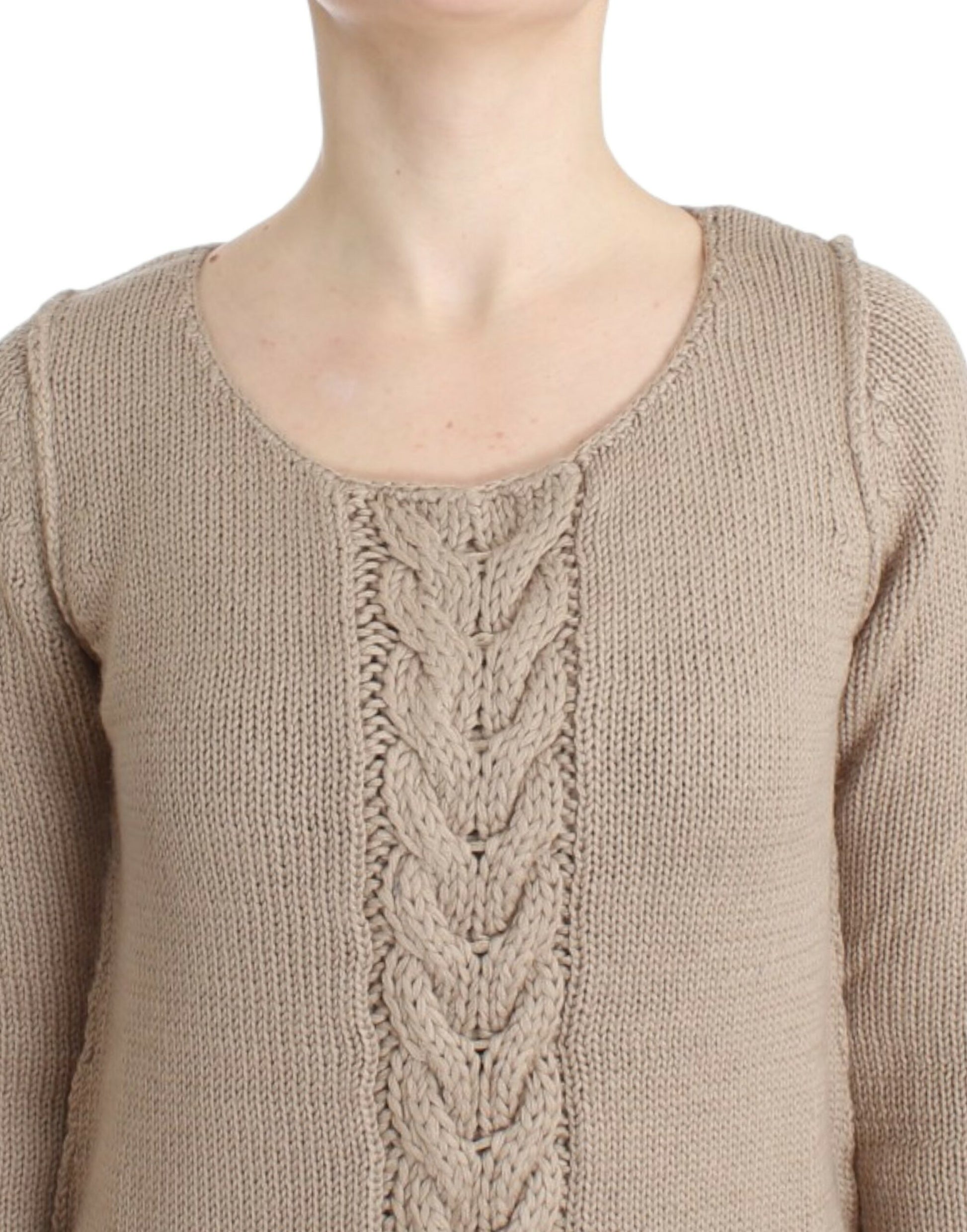 Tan knit sweater with braided design on front
