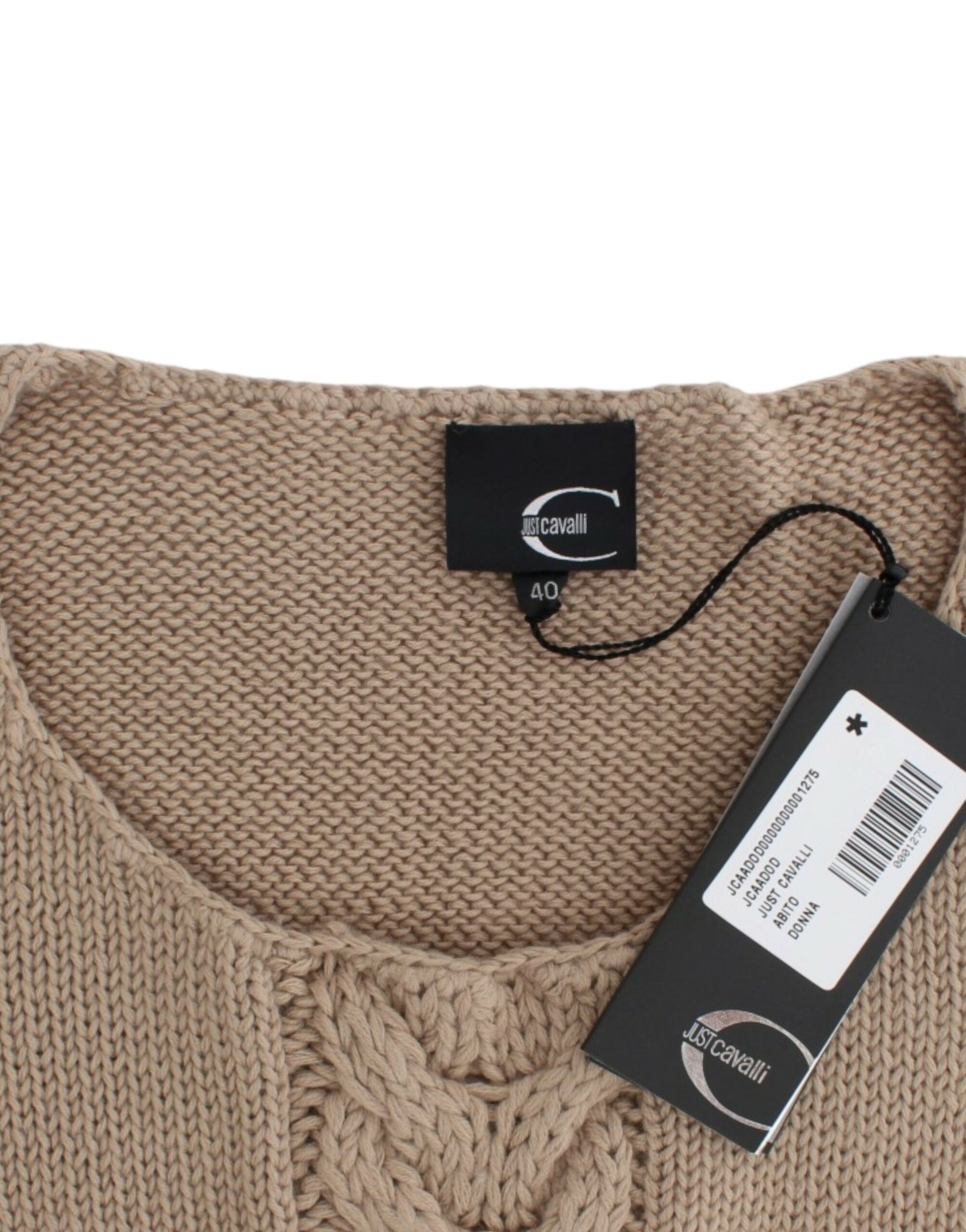 Brown knitted sweater with tag attached to neckline