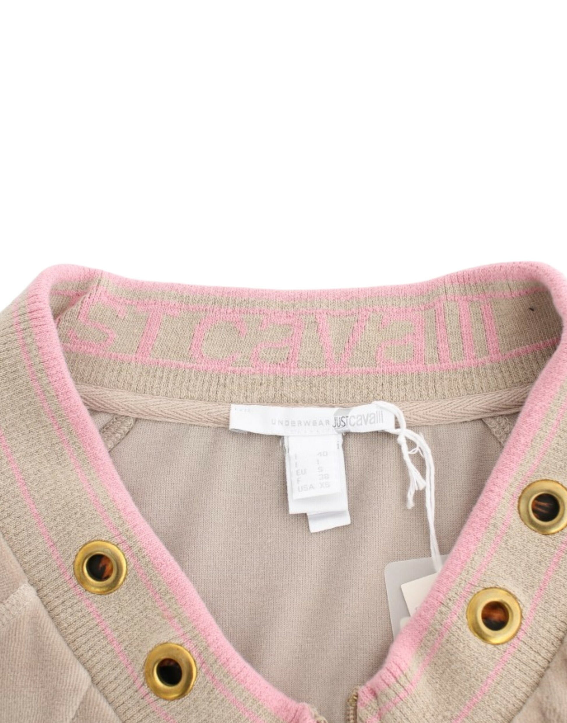 Tan sweater with pink trim and buttons