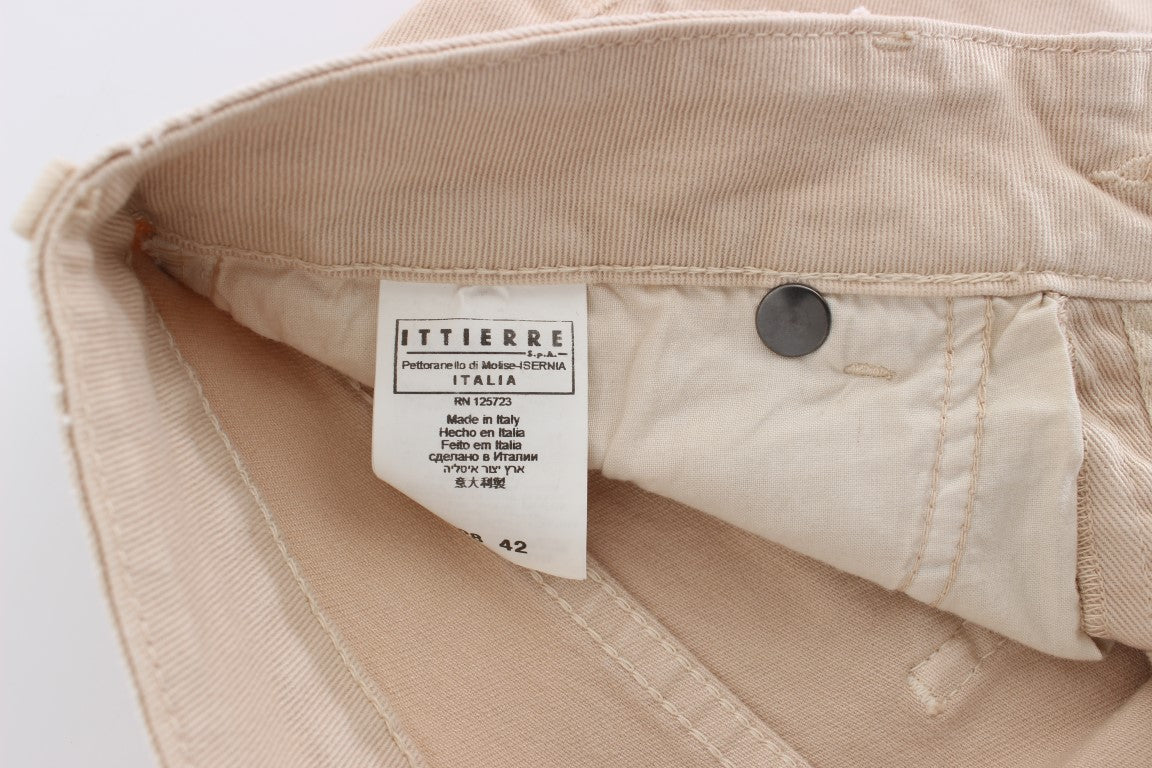Tan denim jeans with tag inside waistband