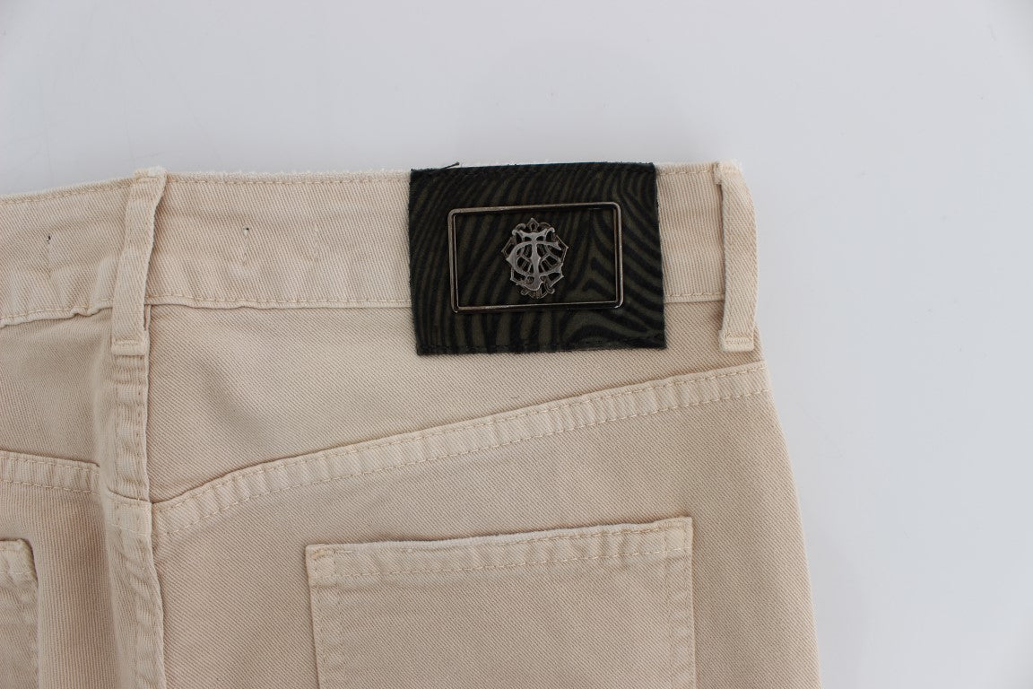 Tan pants with black label on waistband