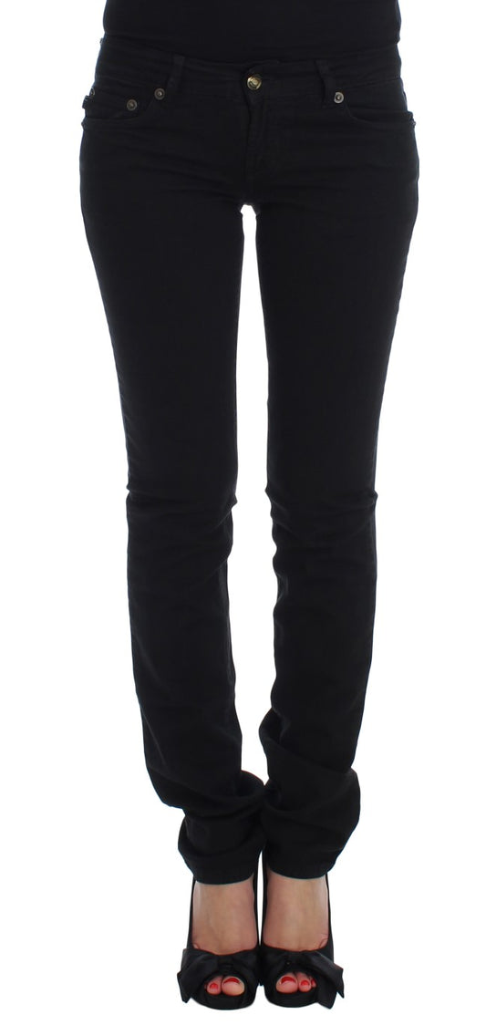 Pair of black skinny jeans with zipper detailing and high waist