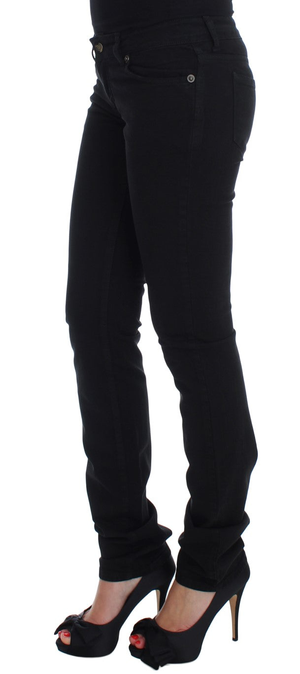 Woman wearing black pants and high heels
