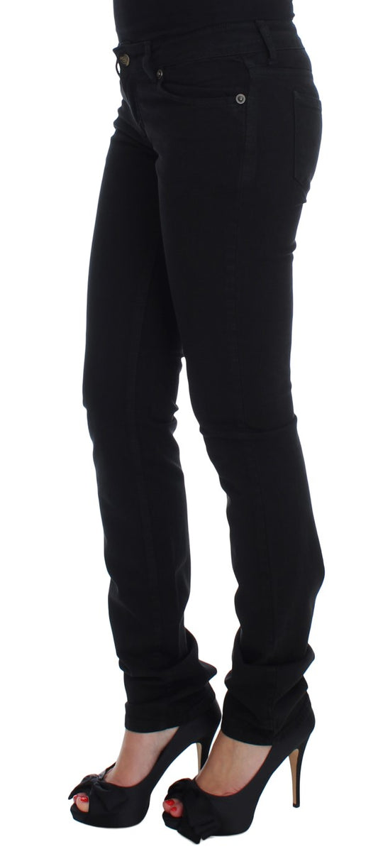 Woman wearing black pants and high heels