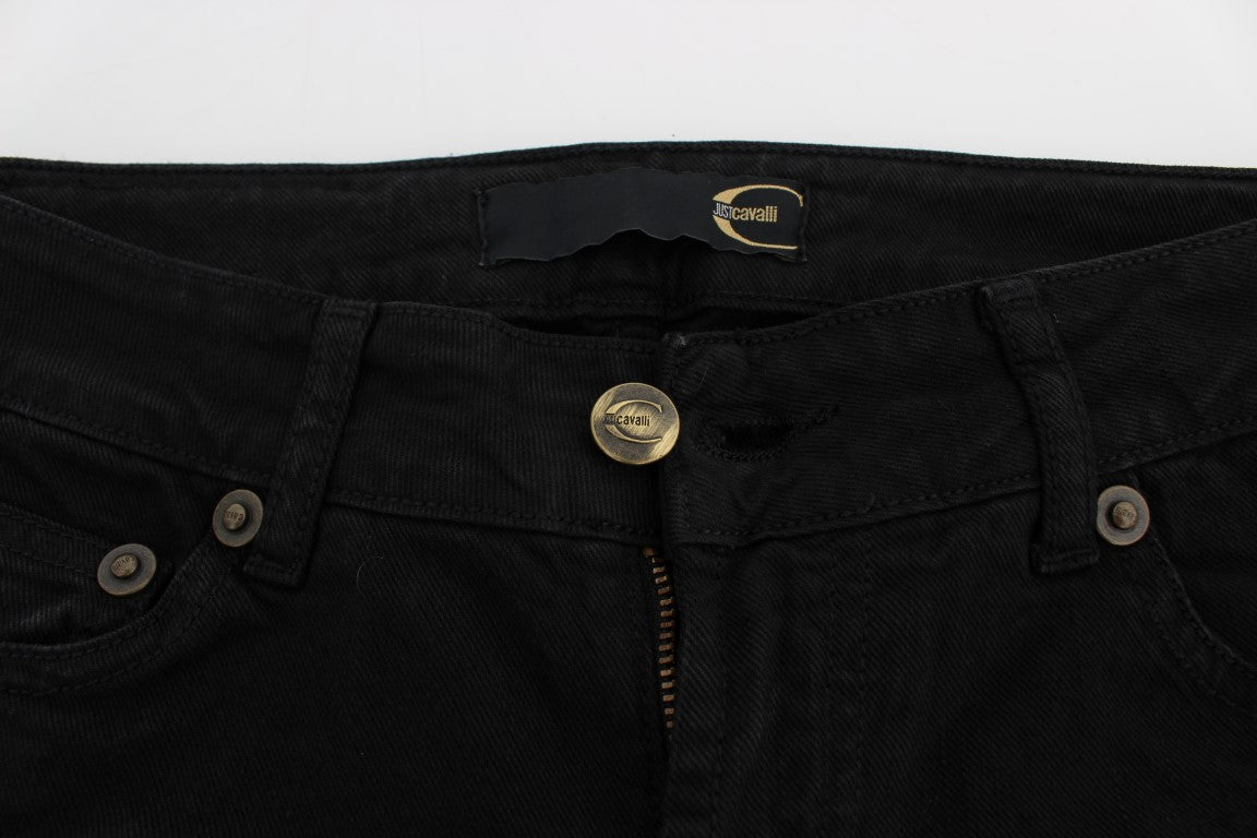 Pair of black jeans with button closure and zipper fly
