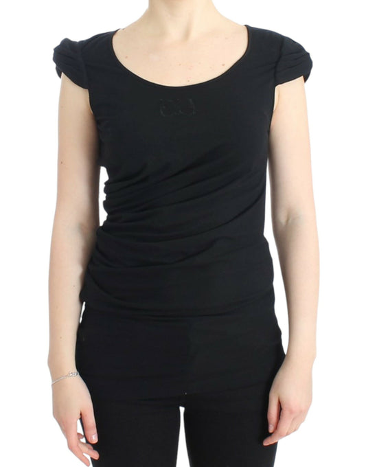 Black sleeveless top on woman