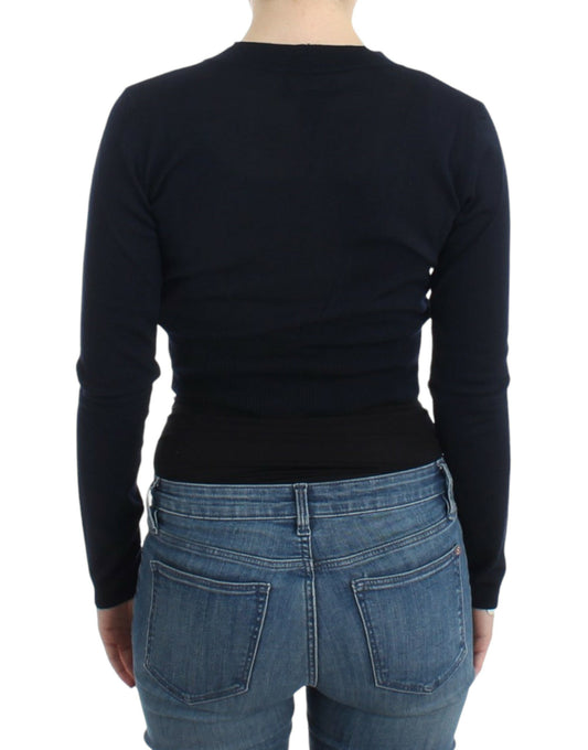 Woman wearing black sweater and blue jeans