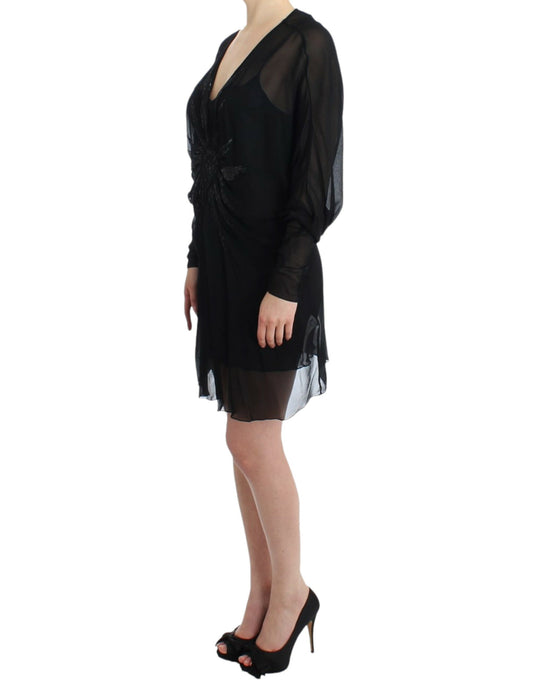 Black dress with sheer overlay