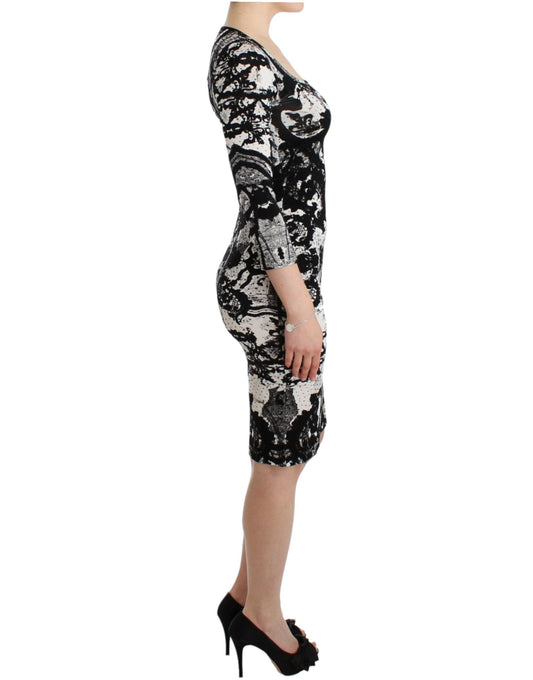 Woman wearing a black and white dress