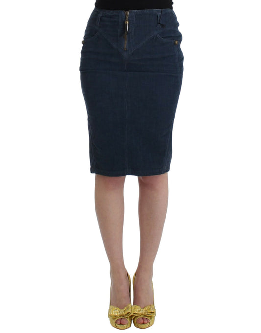 Woman wearing denim skirt and gold shoes