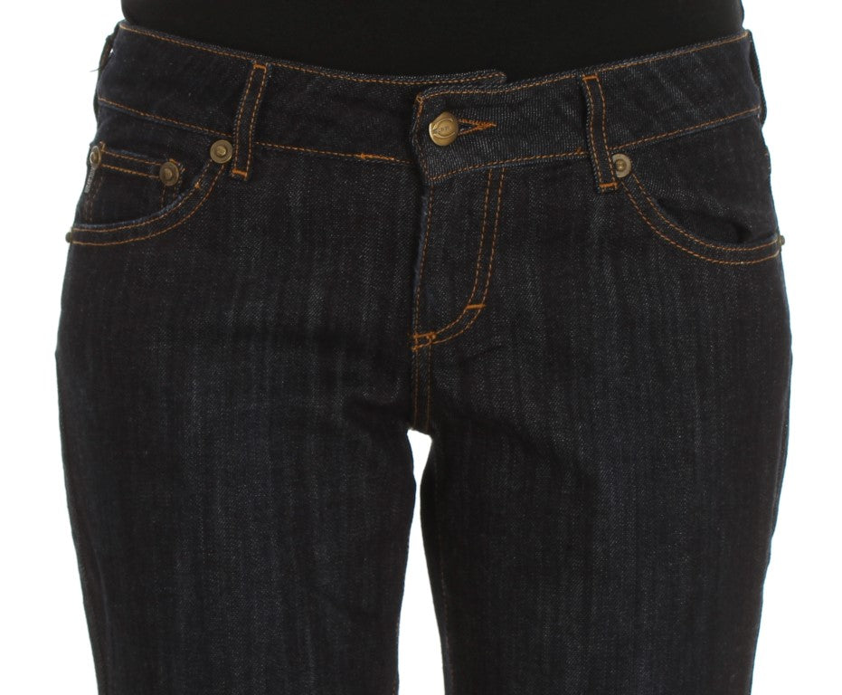 Pair of blue jeans with pockets on front