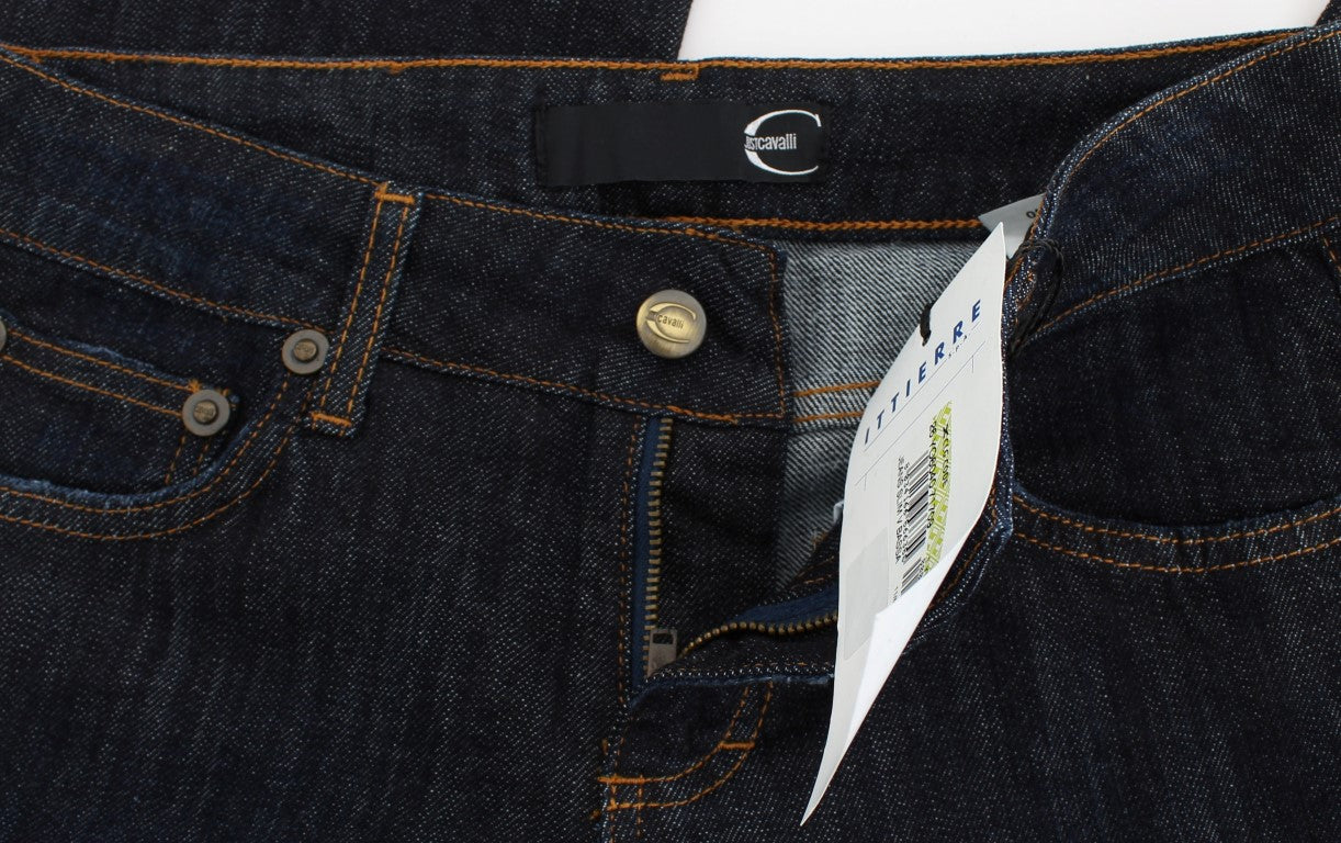 Blue denim jeans with button closure