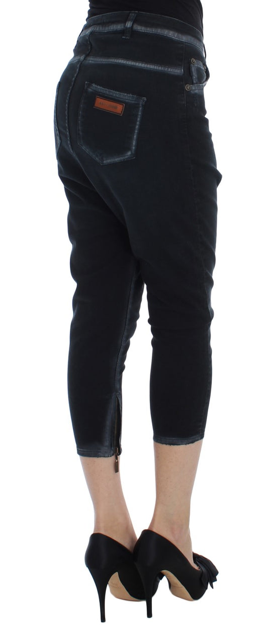Pair of women's jeans with distressed details and a visible back pocket