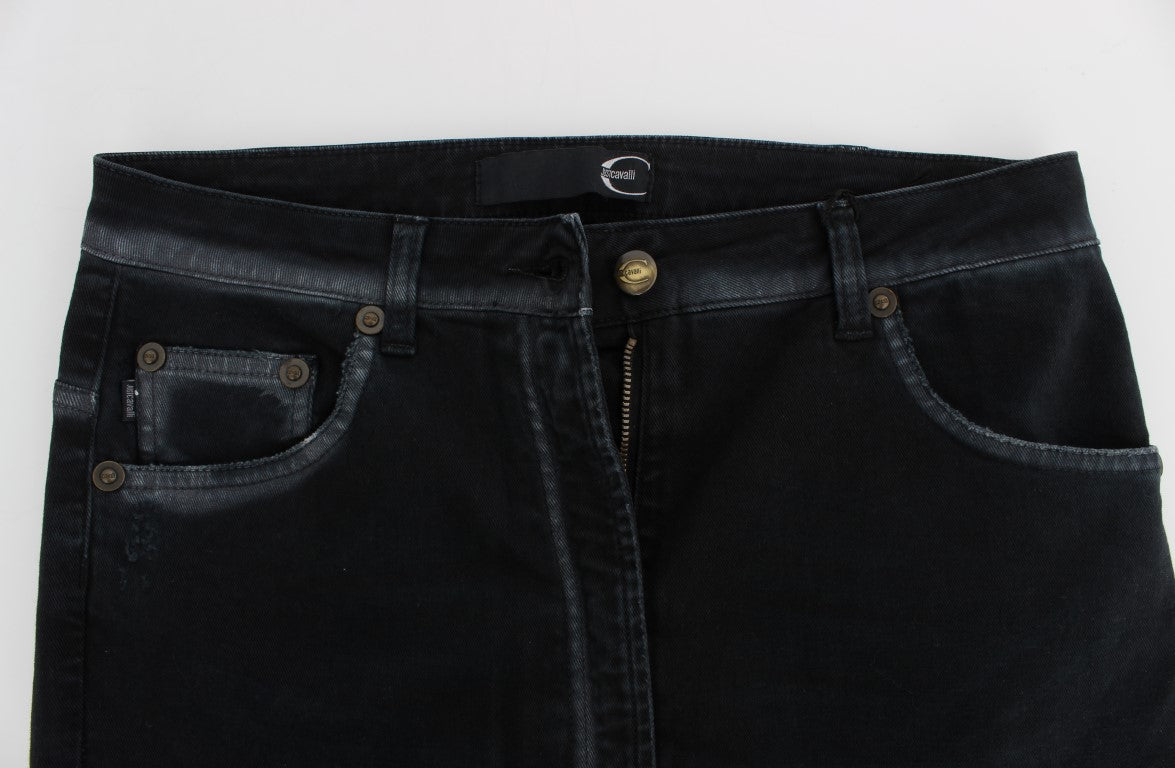 Pair of black denim jeans with zipper and button closure