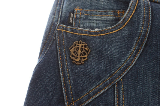 Blue denim jeans with a small embroidered emblem on the back pocket