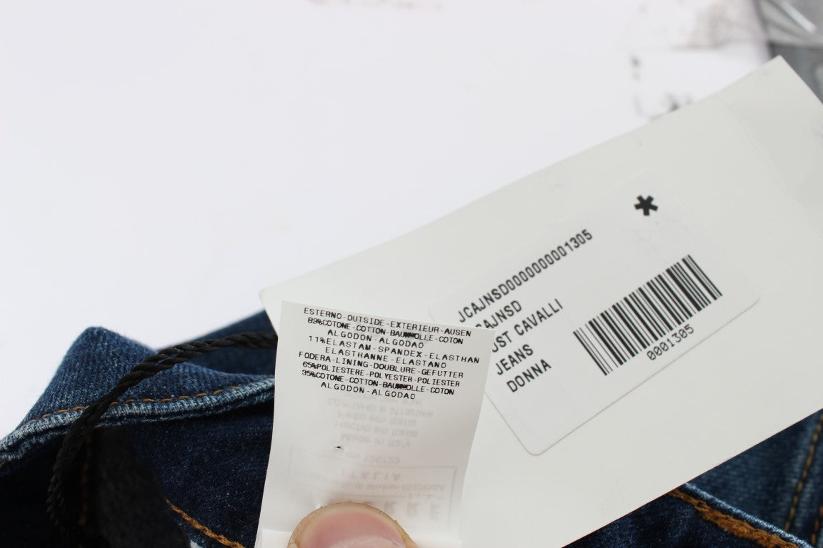 White tag with black lettering on blue jeans