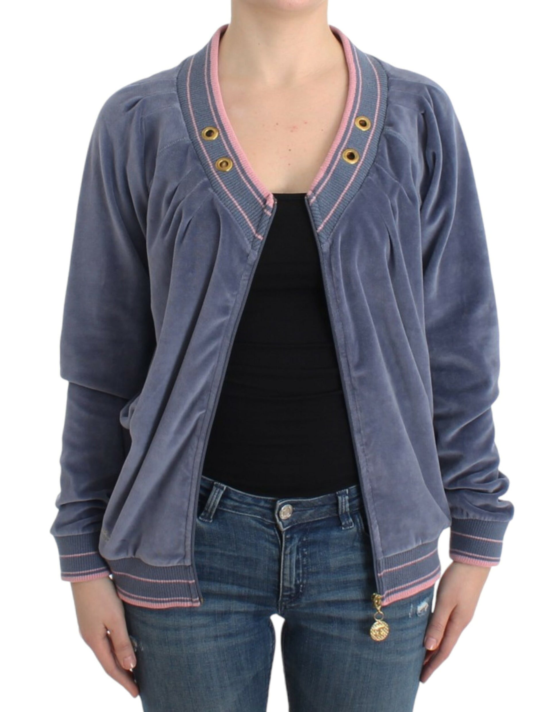 Woman wearing blue velvet jacket over black top