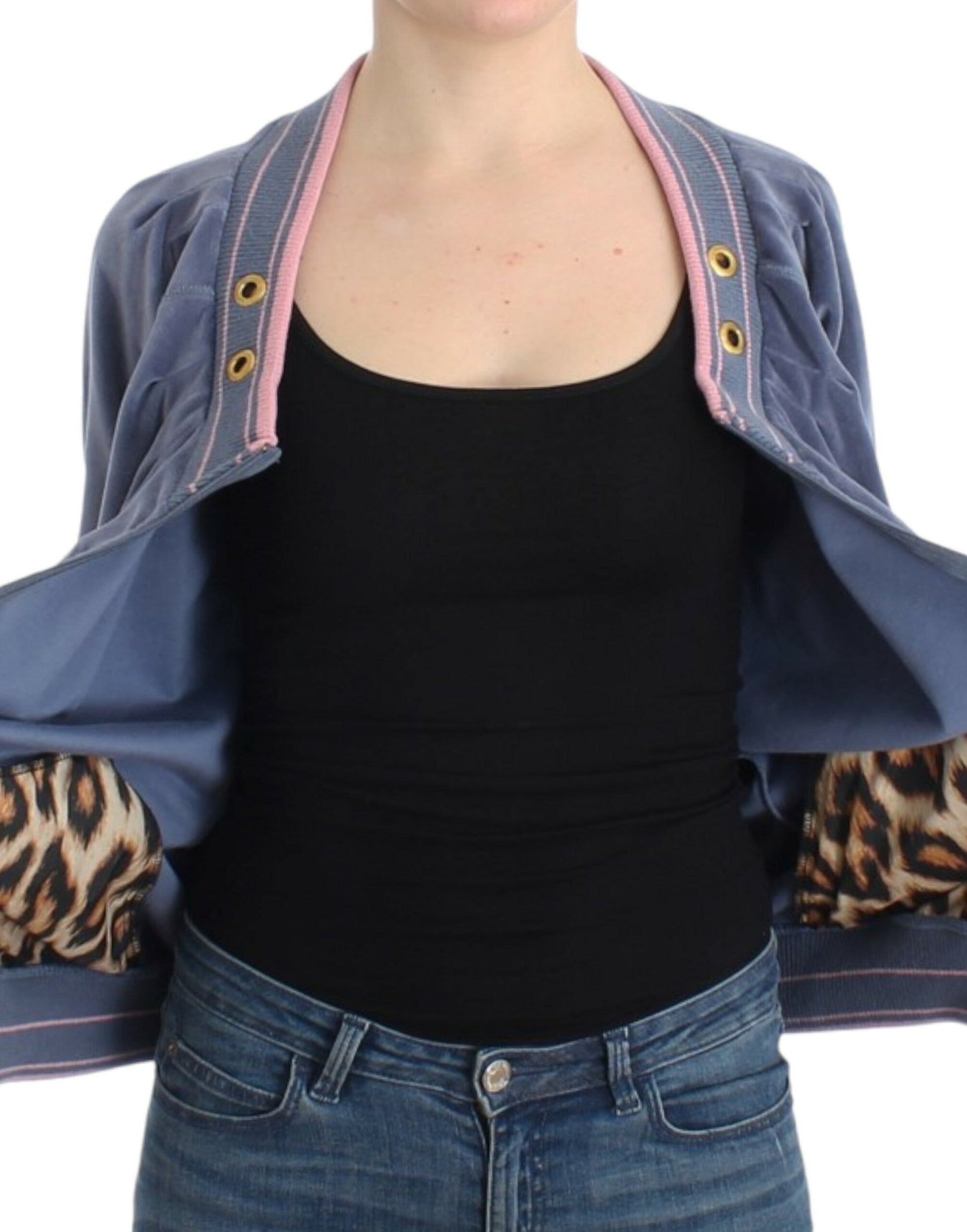 Woman wearing black tank top and blue jeans