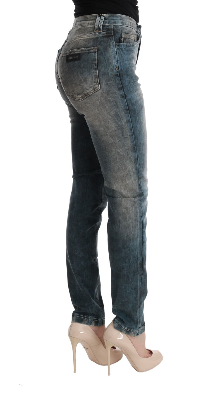 Woman wearing blue jeans and high heels
