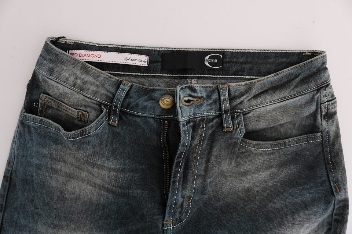Pair of blue jeans on a hanger