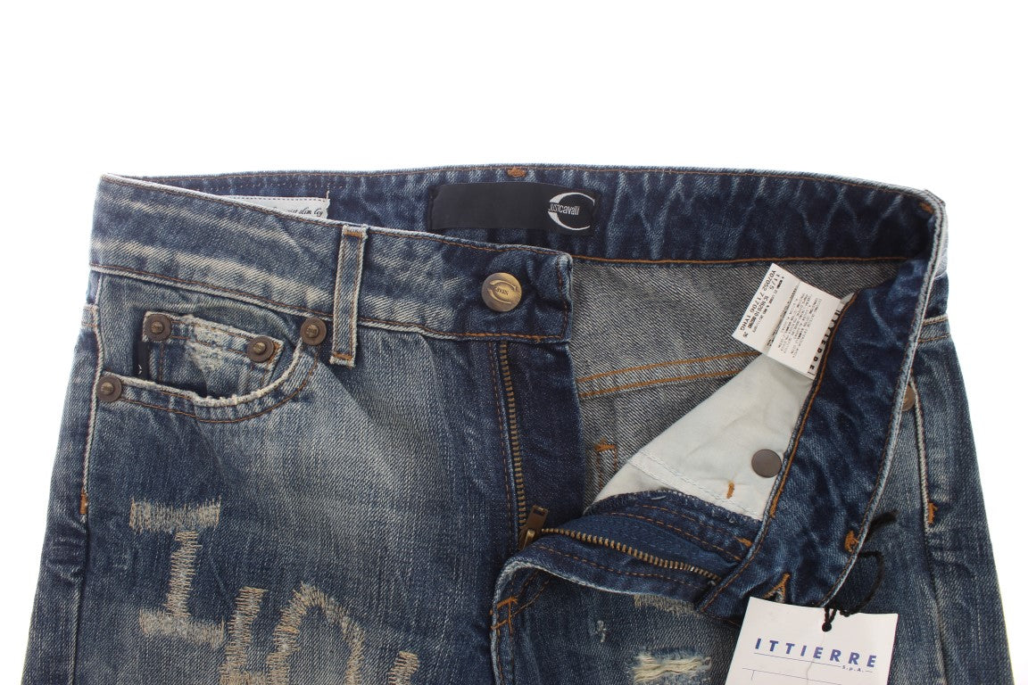 Pair of blue denim jeans with visible stitching and a tag inside