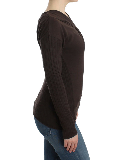 Long sleeve brown sweater on woman's torso