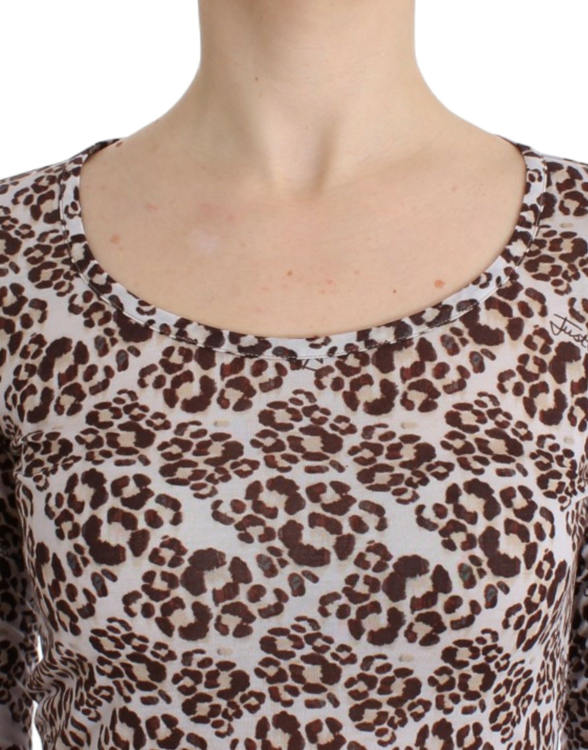 Leopard print top on woman's torso