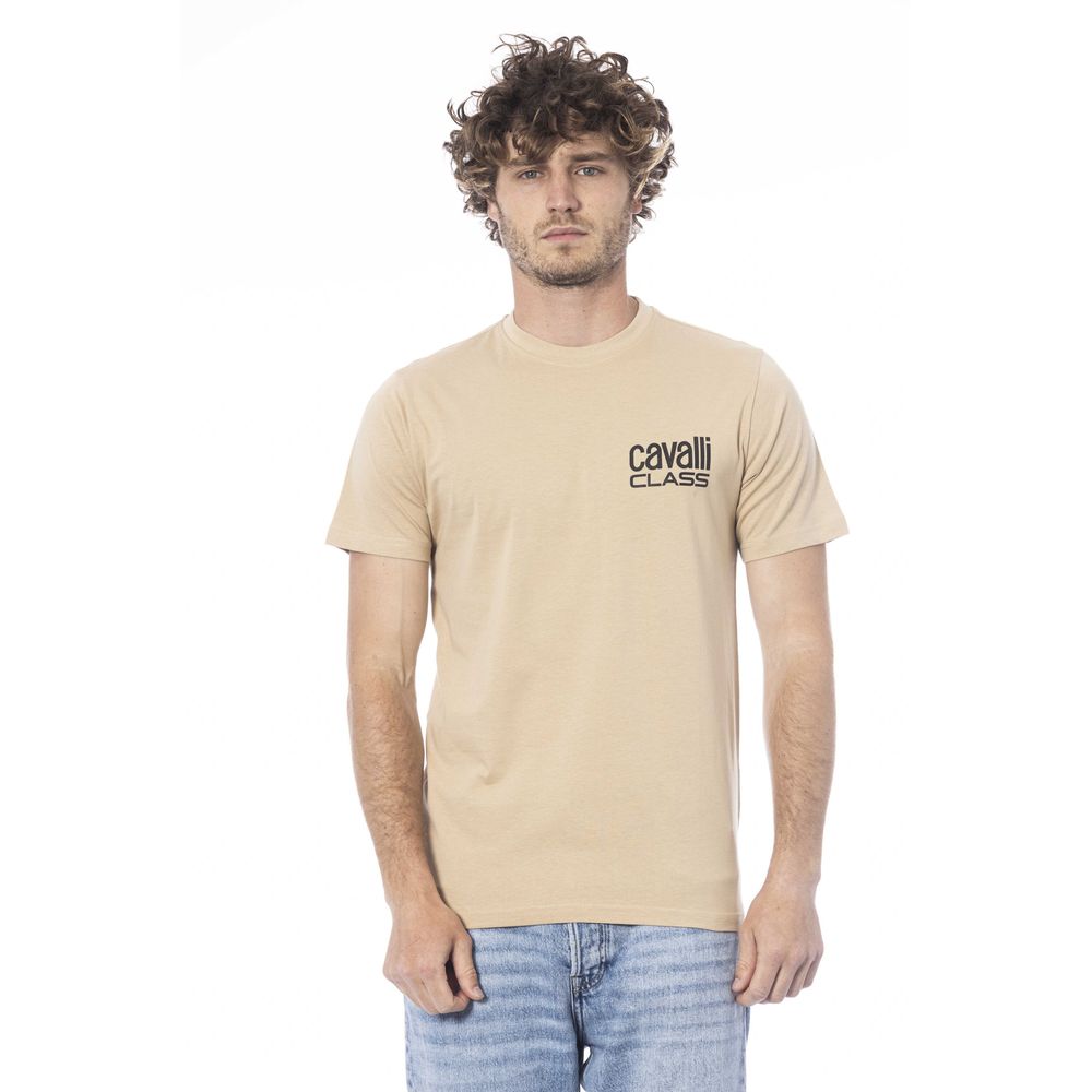 Man wearing tan t-shirt with white logo