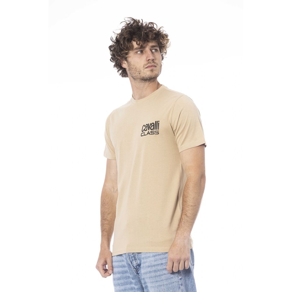 Man wearing beige t-shirt with white logo