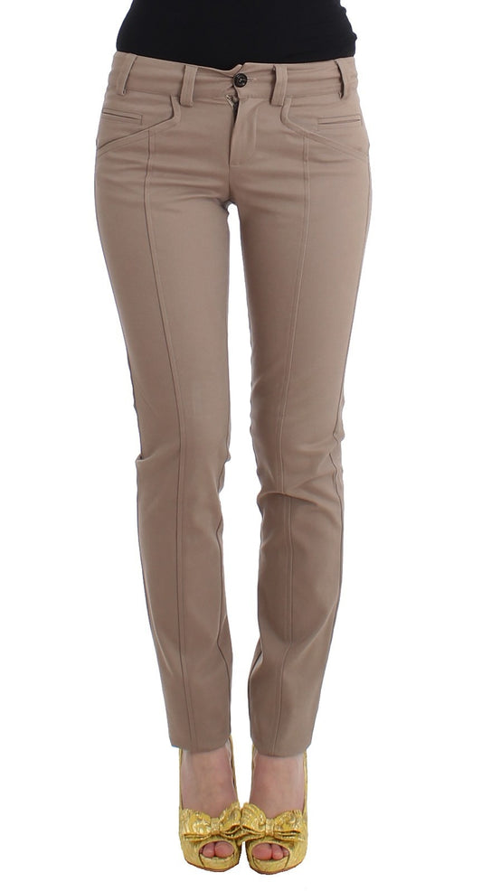 A pair of beige chino pants with a slim fit and straight leg