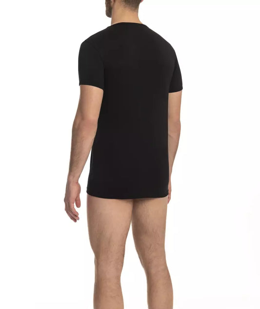 Man wearing black t-shirt and boxer shorts