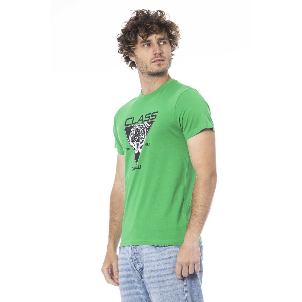 Man wearing green t-shirt with graphic design on front